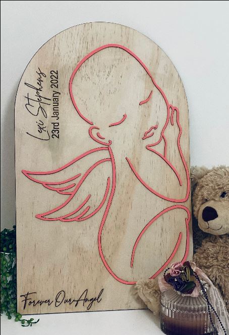 Arch birth detail plaque