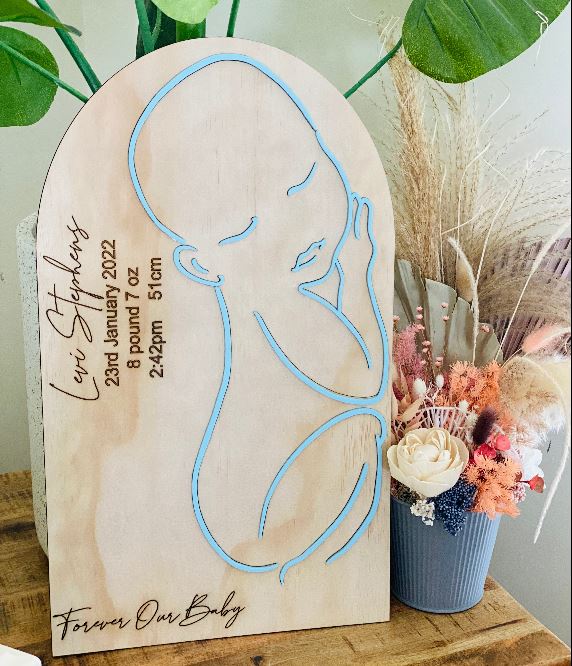 Arch birth detail plaque