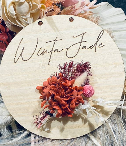 Name plaque with bunch dried flowers